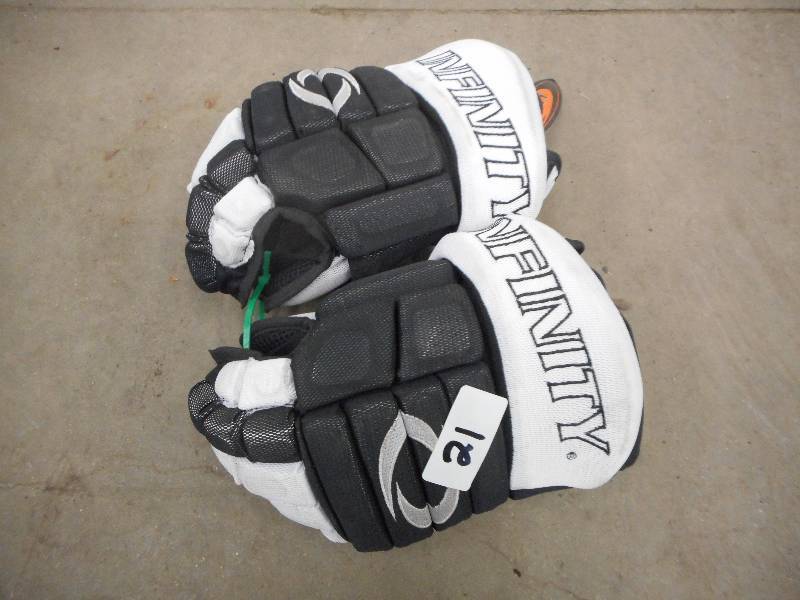 lot 21 image: Pair Of Infinity Size 13.5 Hockey G...