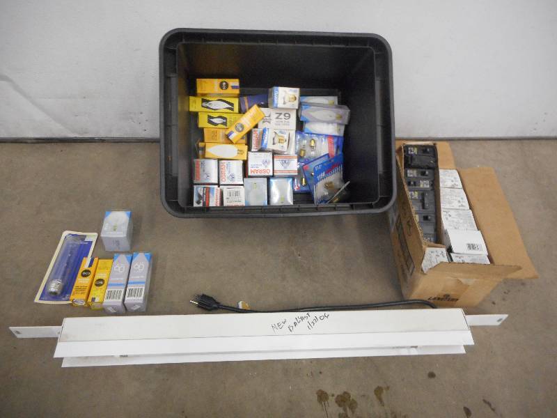 lot 22 image: Bin Of Assorted Light Bulbs, Circui...