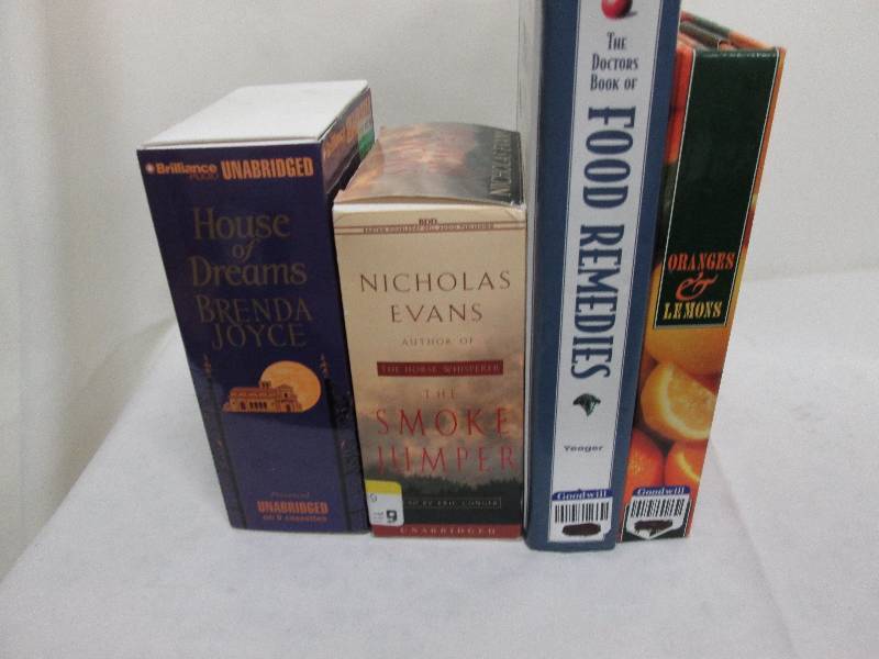 Lot of 4 books, 2 hardcover, 2 on c...