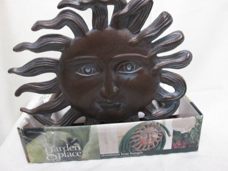 Sun shaped aluminum hose hanger...
