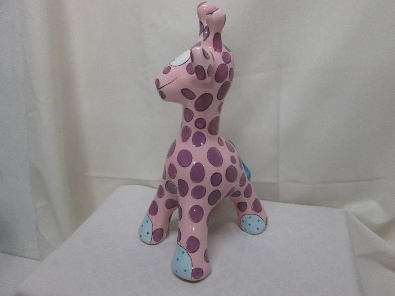 Pinkpurple ceramic giraffe bank...