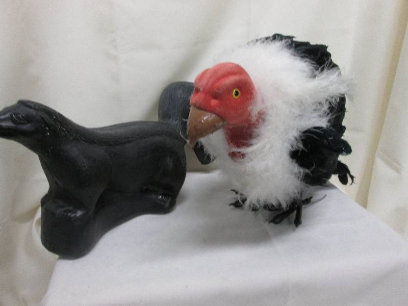Plastic yard skunk, Vulture...