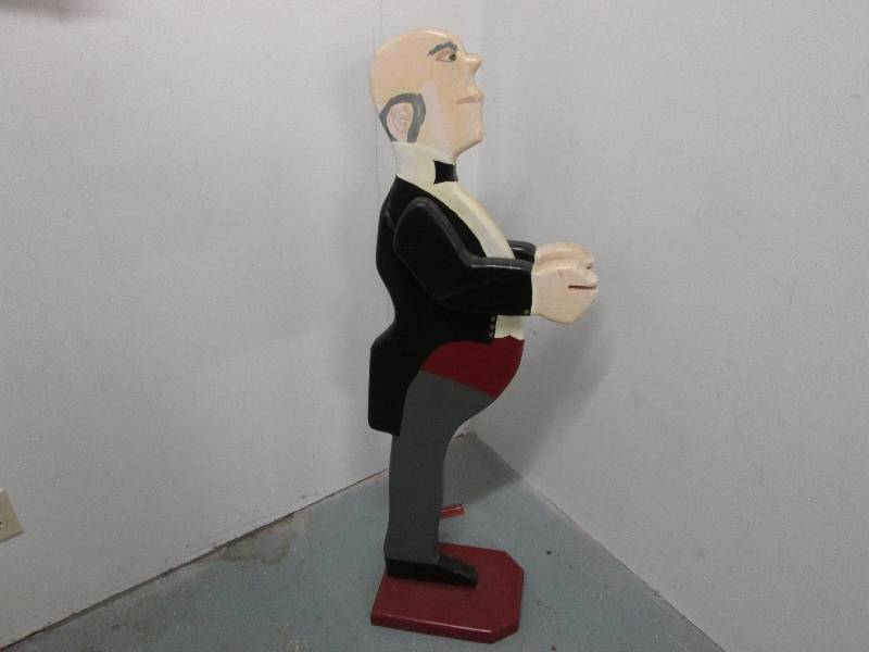 Wooden butler figure 46 inches high...