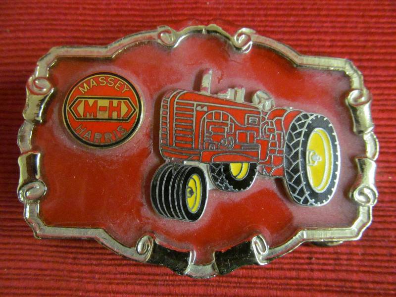 lot 53 image: Massey Harris belt buckle