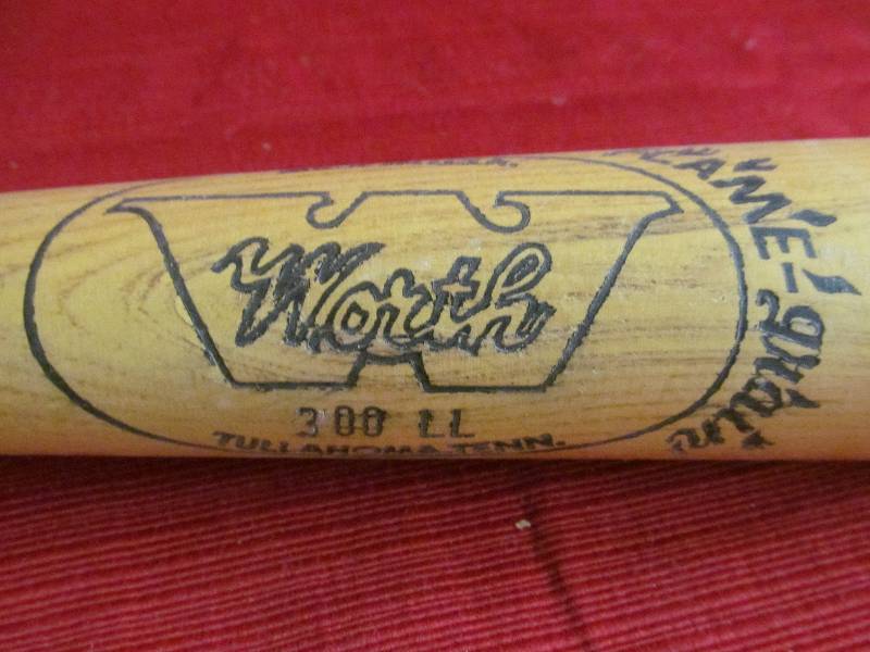 lot 66 image: baseball bat and glove