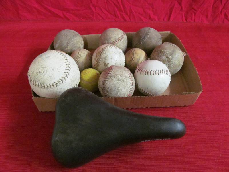 lot 67 image: softballs, bike seat