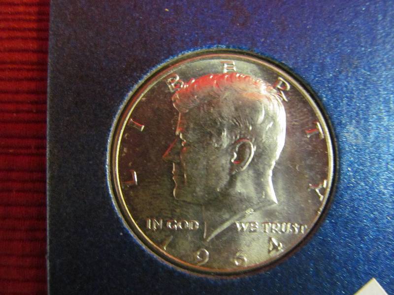lot 115 image: Kennedy 12 dollar