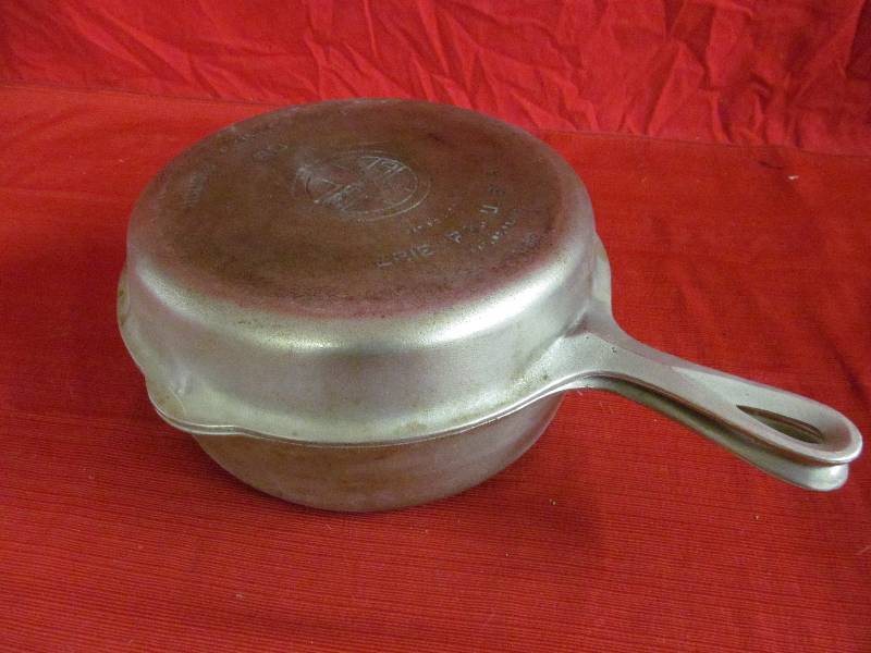 lot 166 image: Griswold double skillet