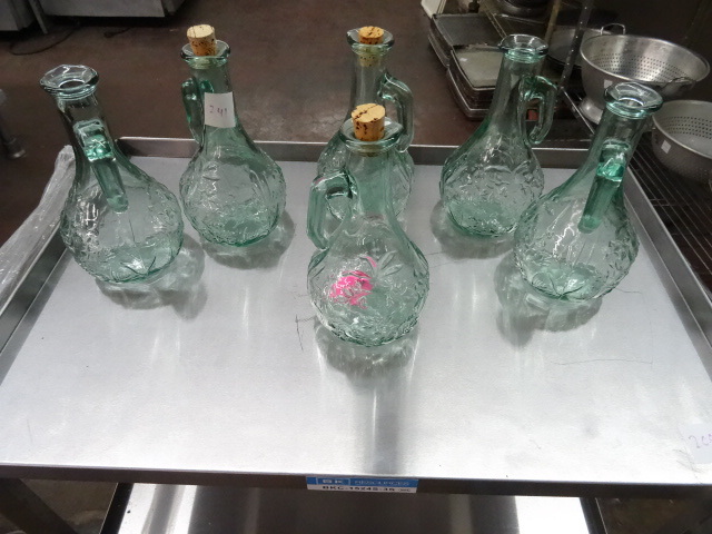 lot 241 image: Oil Bottles