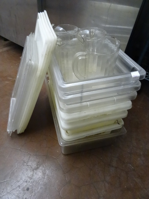 lot 330 image: Misc Tubs with Lids Plastic Pitchers