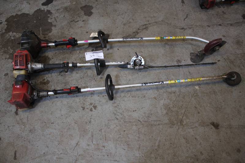 Lot of (3) Yard Tools Including (2) Kawasaki String Trimmer, (1) Redmax GZ23N Straight Shaft Trimmer