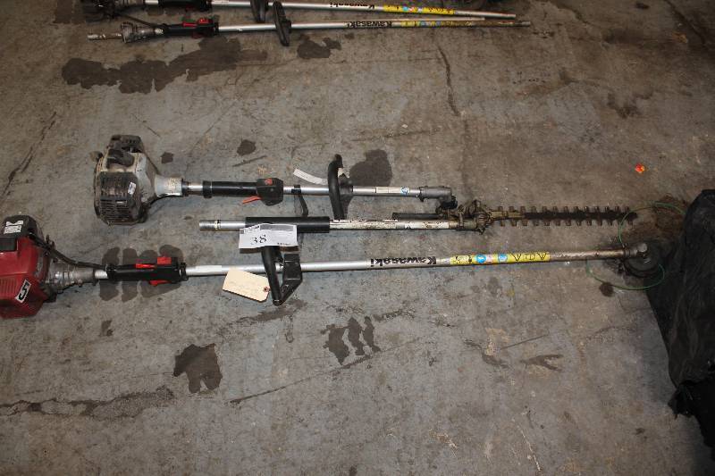 Lot of (2) Yard Tools Including (1) Kawasaki String Trimmer, (1) Redmax GZ23N Straight Shaft Trimmer