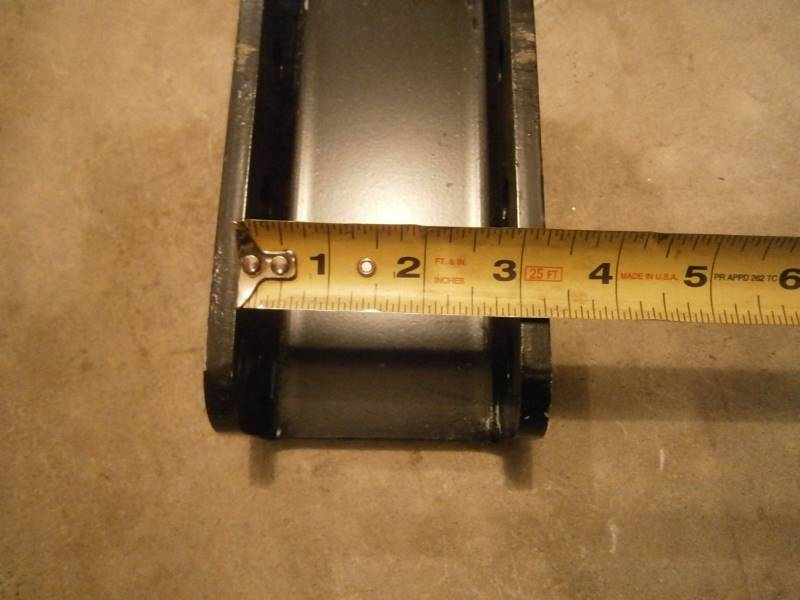 Adjustable weld on hitch plate