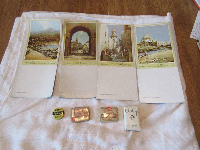 small tins and informational cards for foriegn countries