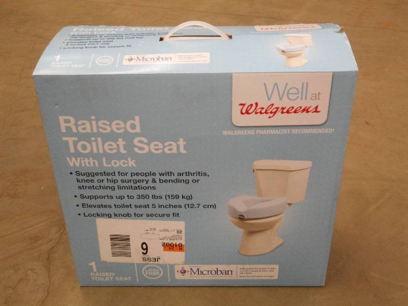 lot 70 image: Raised Toilet Seat With Lock ...
