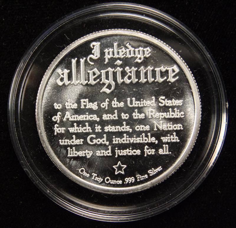 1 TROY OZ. .999 FINE SILVER EAGLE PLEDGE OF ALLEGIANCE DESIGN IN PLASTIC CAPSULE