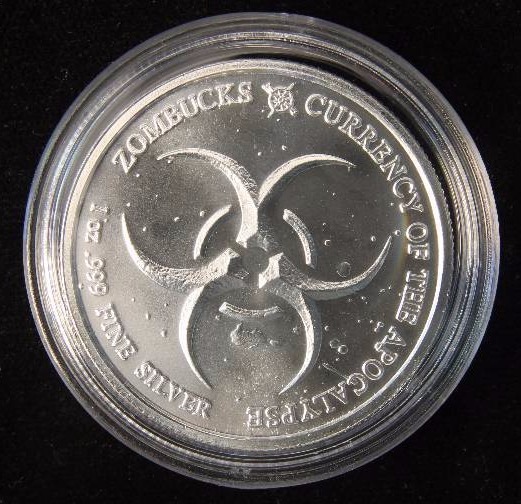 1 TROY OZ. .999 FINE SILVER ZOMBUCKS THE SAINT APOCALYPSE ROUND IN AIRTITE HOLDER