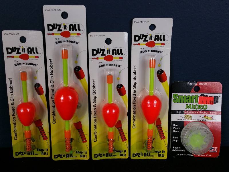 lot 291 image: Group of (4) Bobbers and (1) Package of Bobber Stops