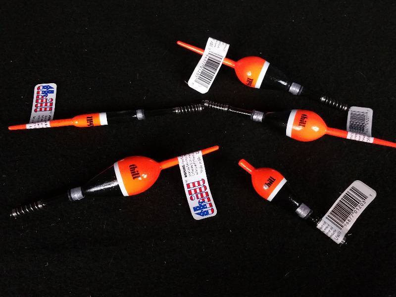 lot 326 image: Group of (5) Premium Thill Weighted Balsa Bobbers