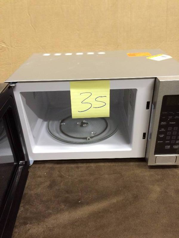 lot 35 image: Magic Chef Microwave Stainless Steel
