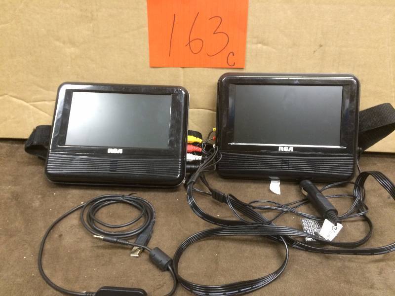 lot 163 image: RCA DRC69705 7-Inch Dual Screen Mobile DVD System used works