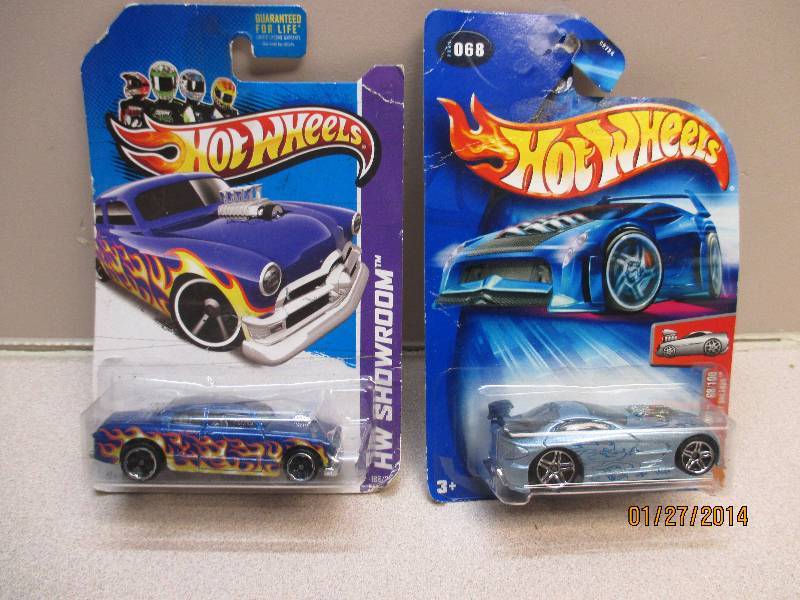 Pair Of Hotwheel Cars In The Package