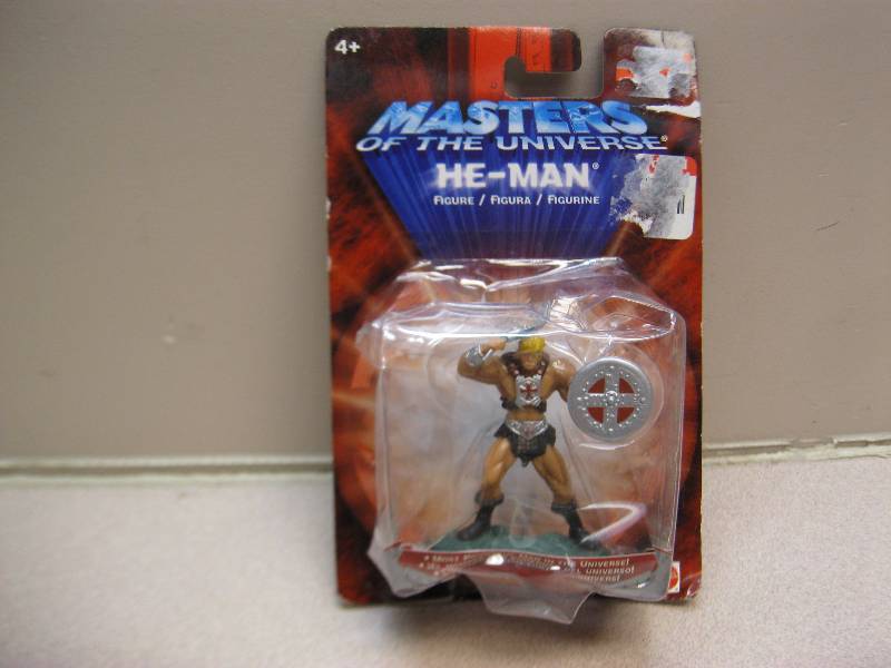 Small He-Man Figure In Package