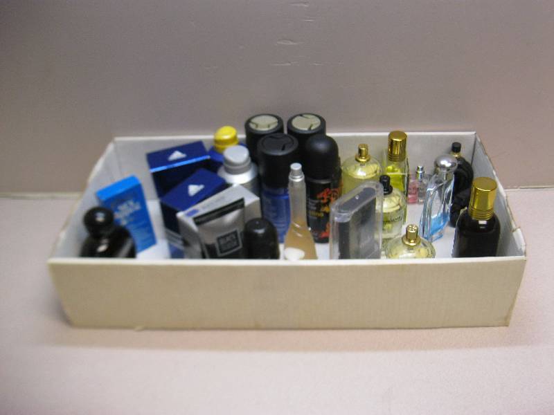 Box Filled With Colognes And Sprays