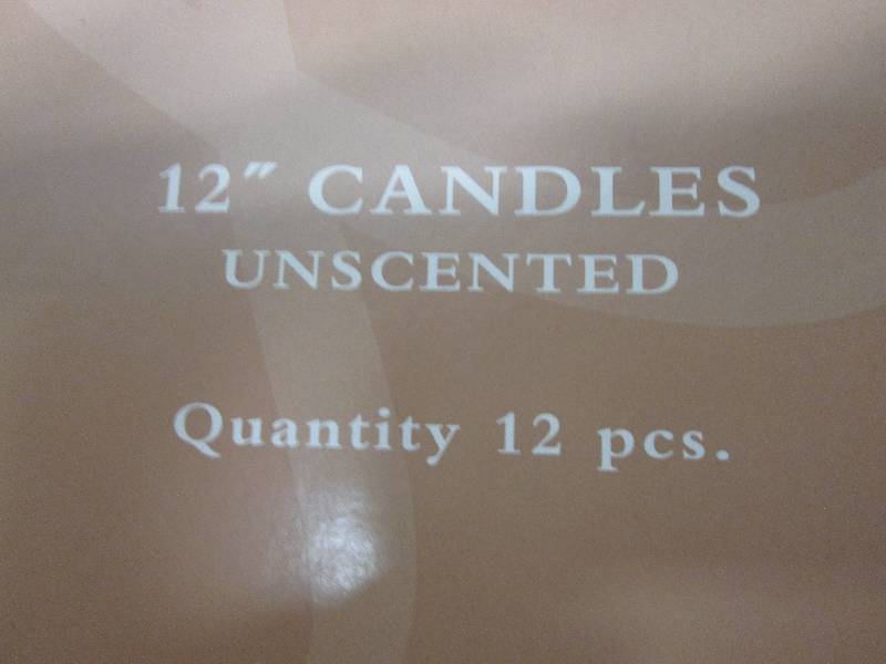 1 box of 12 12 candles unscented...