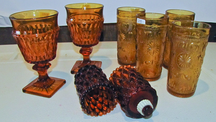 lot 122 image: amber glass items drinking glasses, goblets and votive holder