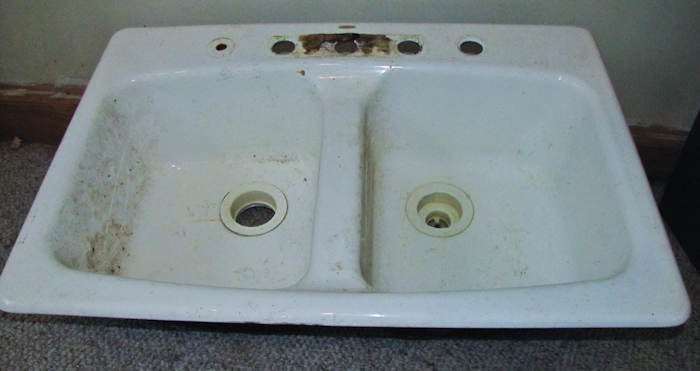 lot 132 image: Kohler cast iron double sink