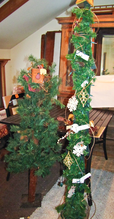 lot 142 image: Two artificial tree type items