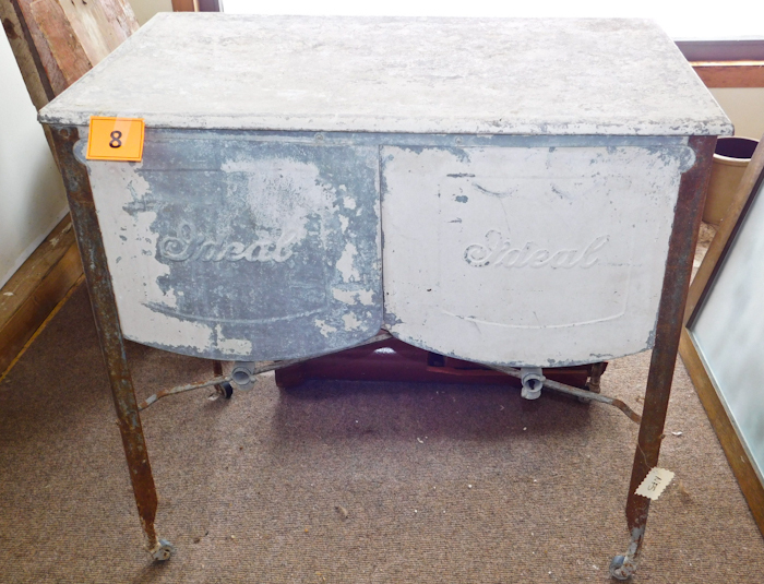 lot 8 image: Vintage metal double sink with metal cover four legs with wheels