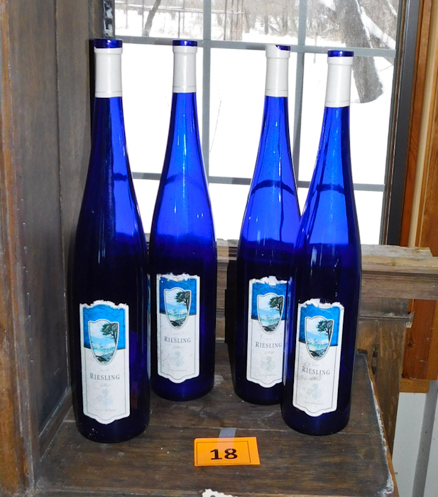 lot 18 image: Cobalt blue tall wine bottles