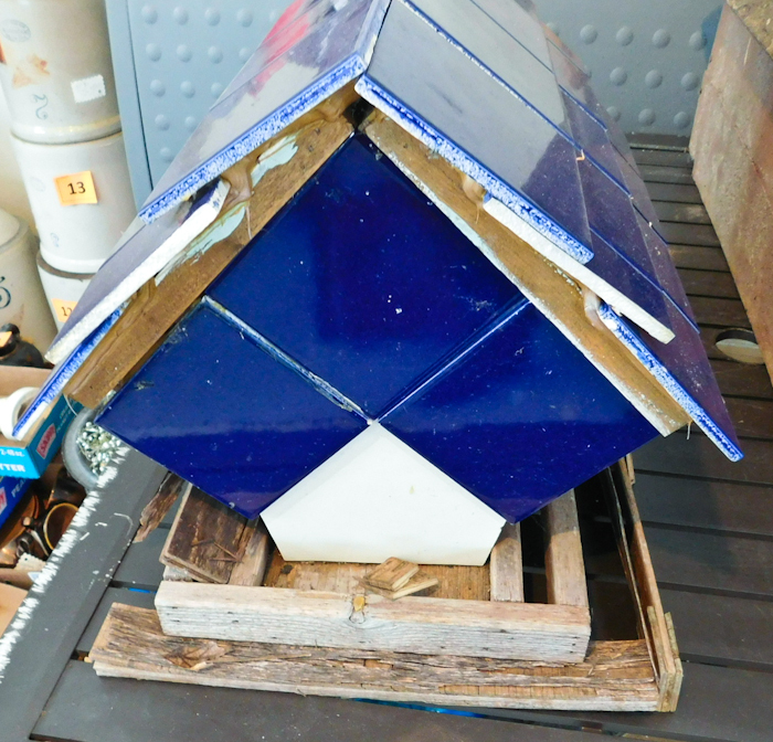 lot 90 image: this looks like a bird feeder that was being tiled