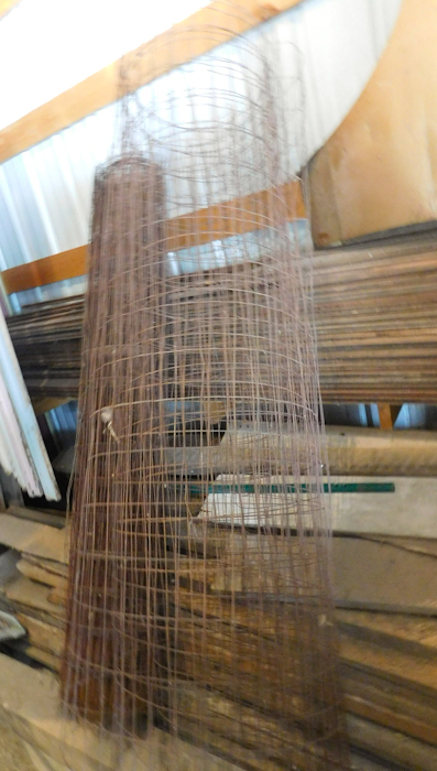 lot 27 image: two rolls of utility fence one is less than the other