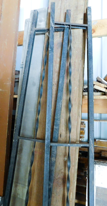 lot 34 image: two tall metal supports of an awning or other lightweight roofing structure