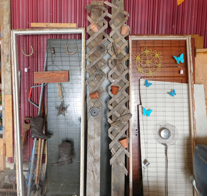 lot 211 image: wood and metal yard garden art please see photos there are 4 pieces