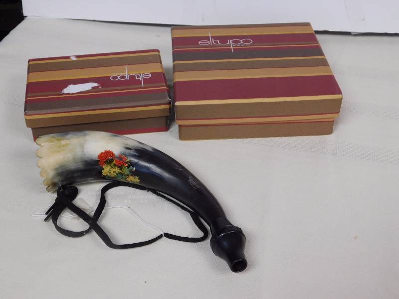 lot 168 image: two Eltupo Peru products NIB and painted bull horn