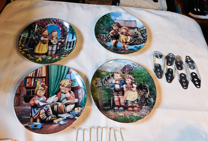 lot 273 image: 4- M. J. Hummel plates with 4 hangers