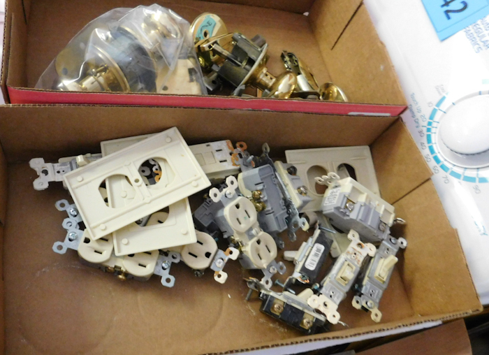 lot 328 image: lot of electrical items removed from the home during remodeling