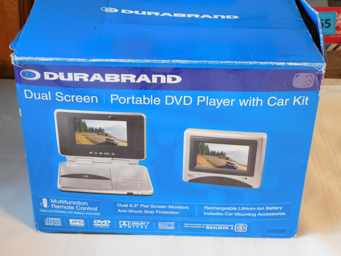 lot 313 image: Durabrand dual screen DVD player with car kit