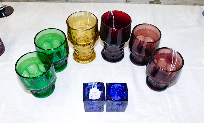 lot 25 image: colorful lot of goblets and two blue candle holders 1 goblet has a chip