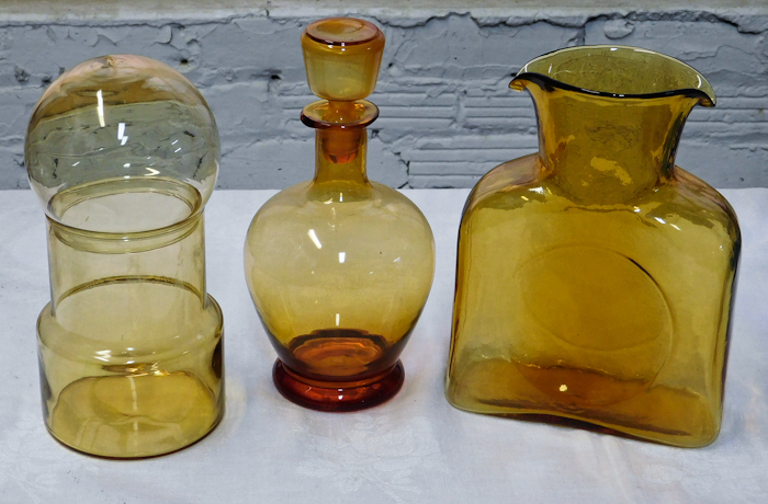 lot 33 image: Amber glass collection