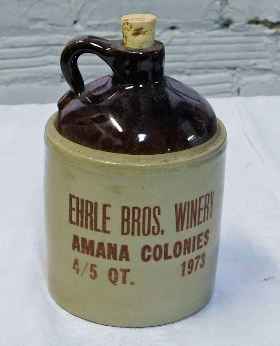 lot 36 image: vintage crock & brown glaze jug advertising