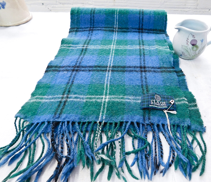 lot 56 image: Lot of Scottish items Tartan green scarf, Laphroaig Pitcher