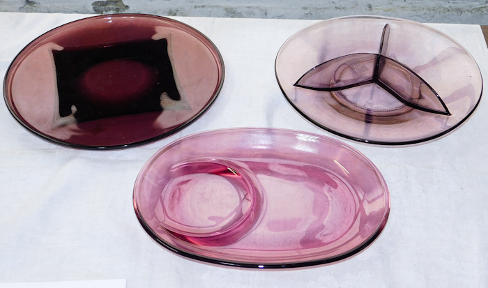 lot 60 image: Amethyst glass platters with amazing glass designs