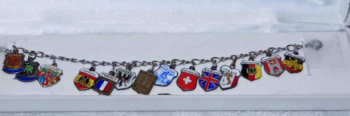 lot 66 image: Sterling bracelet with European silver National charms