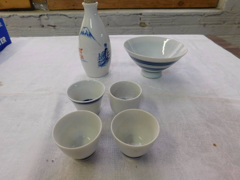 lot 90 image: Sake pitcher four Sake cups and a rice bowl