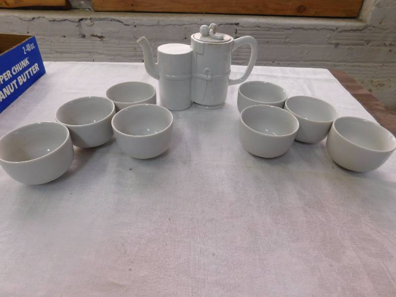 lot 96 image: really cool white tea pot and white 8 white cups